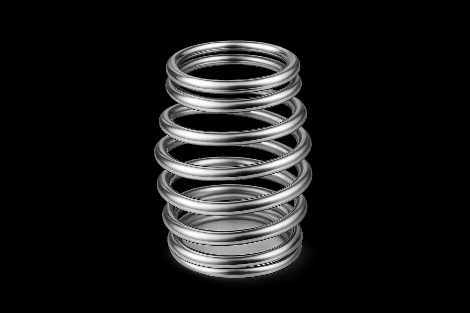 Stainless steel tapered barrel compression spring with black background.